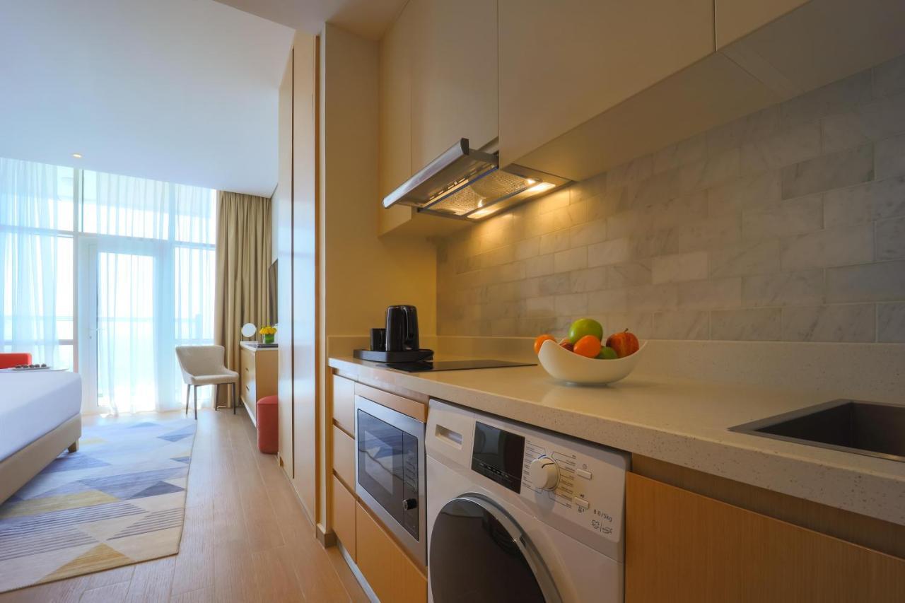 Adagio Jumeirah Village Triangle Dubaj Kültér fotó